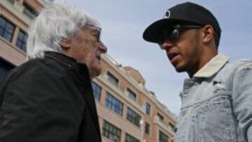 Ecclestone y Hamilton.