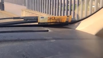 Advierten del nuevo timo del billete de 50 euros en el parabrisas: no se te ocurra bajar del coche bajo ningún concepto