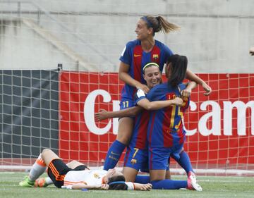 Barcelona players celebrate with goal scorer Gemma