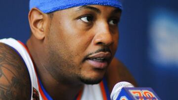 (FILES) This file photo taken on September 26, 2016 shows Carmelo Anthony during a press conference during the New York Knicks Media Day in White Plains, New York.
Carmelo Anthony could join Chris Paul on the Houston Rockets under a trade deal the New York Knicks are seeking while the Cleveland Cavaliers have signed Turkish forward Cedi Osman, ESPN reported on July 12, 2017. The network's website reported the Knicks and Rockets are exploring a swap involving as many as four teams in order to send the 33-year-old playmaker to Texas, with Anthony willing to drop a no-trade clause to make the move.
/ AFP PHOTO / EDUARDO MUNOZ ALVAREZ
