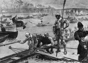 1872, la tripulación de la Universidad de Cambridge se prepara para el comienzo de la carrera.
