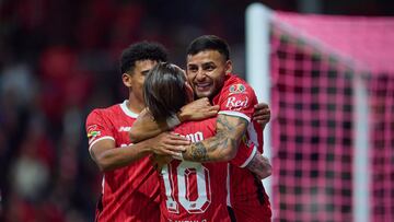 Alexis Vega celebrates his goal 3-0 with Joao Dias of Toluca during the 13th round match between Toluca and Puebla as part of the Liga BBVA MX, Torneo Apertura 2024 at Nemesio Diez Stadium on October 22, 2024 in Toluca, Estado de Mexico, Mexico.
