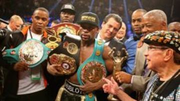 Mayweather gana a Pacquiao y sigue invicto, pero sin brillo