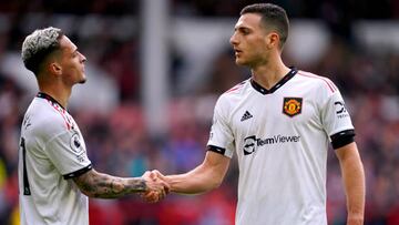Manchester United's Diogo Dalot (right) celebrates with Antony after scoring their side's second goal of the game during the Premier League match at the City Ground, Nottingham. Picture date: Sunday April 16, 2023. (Photo by Nick Potts/PA Images via Getty Images)