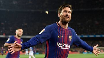 Barcelona's Argentinian forward Lionel Messi celebrates after scoring a goal during the Spanish 'Copa del Rey' (King's cup) quarter-final second leg football match between FC Barcelona and RCD Espanyol at the Camp Nou stadium in Barcel