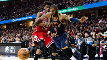 CLEVELAND, OH - FEBRUARY 25: Kyrie Irving #2 of the Cleveland Cavaliers tries to drive past Jimmy Butler #21 of the Chicago Bulls during the first half at Quicken Loans Arena on February 25, 2017 in Cleveland, Ohio. NOTE TO USER: User expressly acknowledges and agrees that, by downloading and/or using this photograph, user is consenting to the terms and conditions of the Getty Images License Agreement. Jason Miller/Getty Images/AFP
== FOR NEWSPAPERS, INTERNET, TELCOS & TELEVISION USE ONLY ==