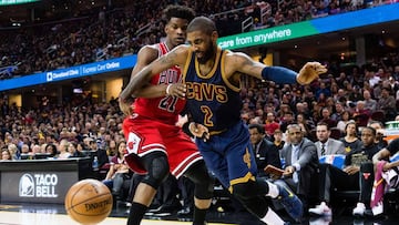 CLEVELAND, OH - FEBRUARY 25: Kyrie Irving #2 of the Cleveland Cavaliers tries to drive past Jimmy Butler #21 of the Chicago Bulls during the first half at Quicken Loans Arena on February 25, 2017 in Cleveland, Ohio. NOTE TO USER: User expressly acknowledges and agrees that, by downloading and/or using this photograph, user is consenting to the terms and conditions of the Getty Images License Agreement.   Jason Miller/Getty Images/AFP
 == FOR NEWSPAPERS, INTERNET, TELCOS &amp; TELEVISION USE ONLY ==