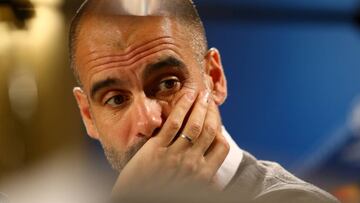 Pep Guardiola of Manchester Citty attends a press conference