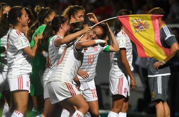 The young Spaniards celebrate after their World Cup semi-final win over France.