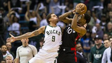 Apr 22, 2017; Milwaukee, WI, USA; Milwaukee Bucks forward Michael Beasley (9) defends Toronto Raptors guard DeMar DeRozan (10) during the fourth quarter in game four of the first round of the 2017 NBA Playoffs at BMO Harris Bradley Center. Mandatory Credit: Jeff Hanisch-USA TODAY Sports