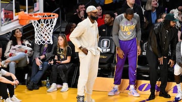 LOS ANGELES, CALIFORNIA - MARCH 05: LeBron James cheers for his team while wearing a boot on his injured foot during a basketball game between the Los Angeles Lakers and the Golden State Warriors at Crypto.com Arena on March 05, 2023 in Los Angeles, California. (Photo by Allen Berezovsky/Getty Images)