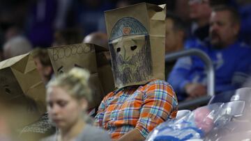 DETROIT, MI - DECEMBER 23: Fans with bags over their head watch the end of the Detroit Lions season at Ford Field on December 23, 2018 in Detroit, Michigan.   Gregory Shamus/Getty Images/AFP
 == FOR NEWSPAPERS, INTERNET, TELCOS &amp; TELEVISION USE ONLY ==
