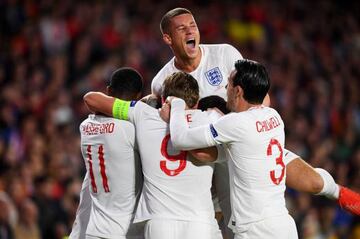 England celebrate Raheem Sterling's opening goal in Seville.