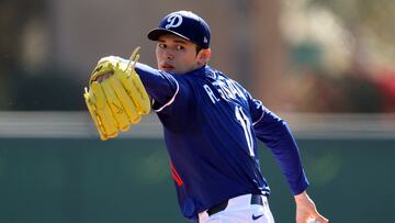 GLENDALE, ARIZONA - FEBRUARY 25: Roki Sasaki #11 of the Los Angeles Dodgers throws during workouts at Camelback Ranch on February 25, 2025 in Glendale, Arizona. Chris Coduto/Getty Images/AFP (Photo by Chris Coduto / GETTY IMAGES NORTH AMERICA / Getty Images via AFP)