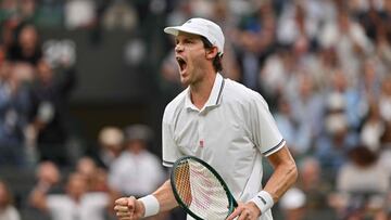 Chile's Nicolas Jarry reacts as he plays against Britain's Cameron Norrie during their men's singles fourth round tennis match on the seventh day of the 2025 Wimbledon Championships at The All England Lawn Tennis and Croquet Club in Wimbledon, southwest London, on July 6, 2025. (Photo by Glyn KIRK / AFP) / RESTRICTED TO EDITORIAL USE