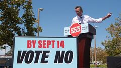 California Governor Gavin Newsom speaks during a campaign rally against his recall election with US Vice President Kamala Harris at the IBEW-NECA Joint Apprenticeship Training Center in San Leandro, California, September 8, 2021. (Photo by SAUL LOEB / AFP