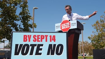 California Governor Gavin Newsom speaks during a campaign rally against his recall election with US Vice President Kamala Harris at the IBEW-NECA Joint Apprenticeship Training Center in San Leandro, California, September 8, 2021. (Photo by SAUL LOEB / AFP