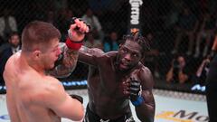 Jared Cannonier golpeando a Marvin Vettori en el UFC Vegas 75.