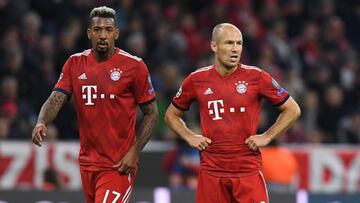 Bayern Munich's German defender Jerome Boateng (L) and Bayern Munich's Dutch midfielder Arjen Robben look on during the UEFA Champions League Group E football match between Bayern Munich and Ajax Amsterdam in Munich, southern Germany, on October