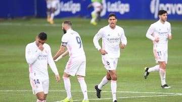 HUESCA, SPAIN - FEBRUARY 06: Raphael Varane of Real Madrid celebrates after scoring his team's first goal during the La Liga Santander match between SD Huesca and Real Madrid at Estadio El Alcoraz on February 06, 2021 in Huesca, Spain. Sporting stadi