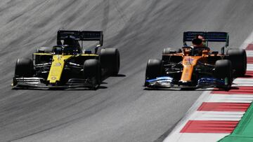 SPIELBERG, AUSTRIA - JUNE 30: Daniel Ricciardo of Australia driving the (3) Renault Sport Formula One Team RS19 and Carlos Sainz of Spain driving the (55) McLaren F1 Team MCL34 Renault battle for position during the F1 Grand Prix of Austria at Red Bull Ring on June 30, 2019 in Spielberg, Austria. (Photo by Charles Coates/Getty Images)