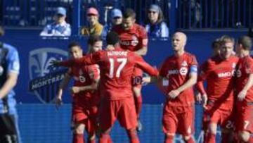 Jugadores del Toronto FC celebrando el gol de Giovinco. 