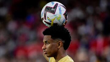 Barcelona's Spanish defender Alejandro Balde holds the ball during the Spanish league football match between Sevilla FC and FC Barcelona at the Ramon Sanchez Pizjuan stadium in Seville, on September 2, 2022. (Photo by CRISTINA QUICLER / AFP)