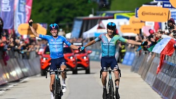 XDS Astana Team's Italian rider Christian Scaroni (R) celebrates alongside second placed XDS Astana Team's Italian rider Lorenzo Fortunato after victory as he crosses the finish line of the 16th stage of the 108th Giro d'Italia cycling race of 203kms from Piazzola sul Brenta to San Valentino on May 27, 2025. (Photo by Ivan Benedetto / AFP)
