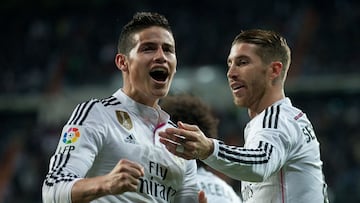 MADRID, SPAIN - APRIL 18: James Rodriguez (L) of Real Madrid CF celebrates scoring their second goal with teammate Sergio Ramos (R) during the La Liga match between Real Madrid CF and Malaga CF at Estadio Santiago Bernabeu on April 18, 2015 in Madrid, Spain. (Photo by Gonzalo Arroyo Moreno/Getty Images)