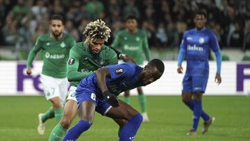 Gent's Elisha Owusu, front, duels for the ball with Saint-Etienne's Mahdi Camara during the Europa League group I soccer match between Saint Etienne and Gent at Geoffroy Guichard stadium in Saint Etienne, central France, Thursday, Nov. 28, 2019.