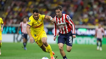 Sebastian Caceres (L) of America fights for the ball with Mateo Chavez (R) of Guadalajara during the round of 16 first leg match between Guadalajara and America as part of the CONCACAF Champions Cup 2025, at Akron Stadium on March 05, 2025 in Guadalajara, Jalisco, Mexico.