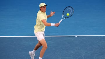 Italy's Jannik Sinner hits a return against Australia�s Tristan Schoolkate during their men's singles match on day five of the Australian Open tennis tournament in Melbourne on January 16, 2025. (Photo by DAVID GRAY / AFP) / -- IMAGE RESTRICTED TO EDITORIAL USE - STRICTLY NO COMMERCIAL USE --
