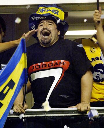 Diego Armando Maradona supporting Boca Juniors at La Bombonera.