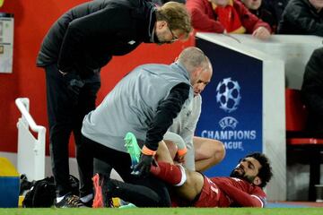 Salah receives treatment at Anfield.