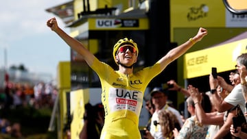 Cycling - Tour de France - Stage 15 - Loudenvielle to Plateau de Beille - Loudenvielle , France - July 14, 2024 UAE Team Emirates' Tadej Pogacar celebrates winning stage 15 REUTERS/Stephane Mahe