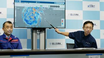 A director of the Japan Meteorological Agency's Forecast Division holds a press conference on Typhoon Nanmadol in Tokyo on September 18, 2022. - Japan OUT (Photo by JIJI PRESS / AFP) / Japan OUT (Photo by STR/JIJI PRESS/AFP via Getty Images)