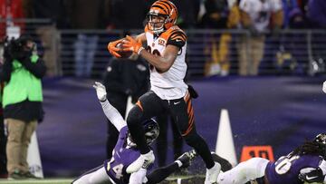 BALTIMORE, MD - DECEMBER 31: Wide Receiver Tyler Boyd #83 of the Cincinnati Bengals scores a touchdown in the fourth quarter against the Baltimore Ravens at M&T Bank Stadium on December 31, 2017 in Baltimore, Maryland. Patrick Smith/Getty Images/AFP