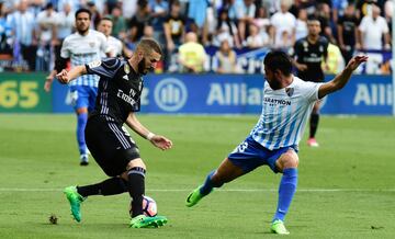  Karim Benzema y Miguel Torres.