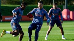 MANCHESTER, ENGLAND - OCTOBER 25:   Fred and Cristiano Ronaldo of Manchester United in action during a Manchester United training session at Carrington Training Ground on October 25, 2022 in Manchester, England. (Photo by Ash Donelon/Manchester United via Getty Images)