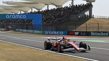 Ferrari's British driver Lewis Hamilton drives during the first practice session of the Formula One Chinese Grand Prix at the Shanghai International Circuit in Shanghai on March 21, 2025. (Photo by Jade Gao / AFP)
