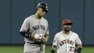 HOUSTON, TX - JULY 02: Aaron Judge #99 of the New York Yankees talks with Jose Altuve #27 of the Houston Astros after hitting a double in the first inning at Minute Maid Park on July 2, 2017 in Houston, Texas.   Bob Levey/Getty Images/AFP
 == FOR NEWSPAPERS, INTERNET, TELCOS &amp; TELEVISION USE ONLY ==