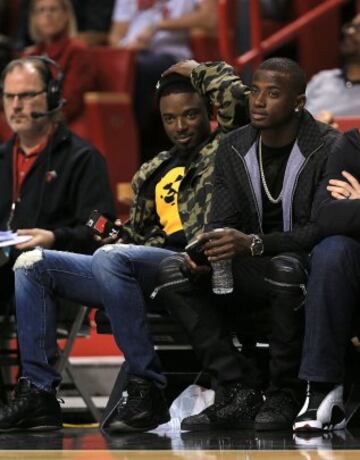 Dee Gordon y Adeiny Hechavarria, jugadores del equipo de béisbol Miami Marlins.