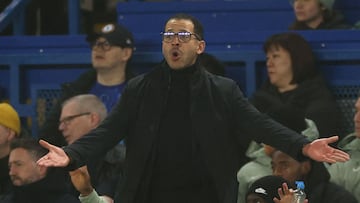 Chelsea's English head coach Liam Rosenior gestures on the touchline during the English Premier League football match between Chelsea and Leeds United at Stamford Bridge in London on February 10, 2026. (Photo by Adrian Dennis / AFP) / RESTRICTED TO EDITORIAL USE. No use with unauthorized audio, video, data, fixture lists, club/league logos or 'live' services. Online in-match use limited to 120 images. An additional 40 images may be used in extra time. No video emulation. Social media in-match use limited to 120 images. An additional 40 images may be used in extra time. No use in betting publications, games or single club/league/player publications. /