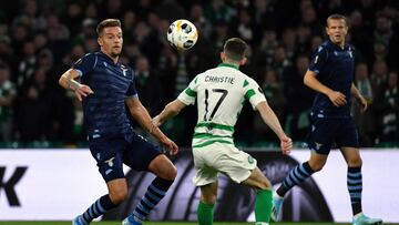 GLASGOW, SCOTLAND - OCTOBER 24:  Sergej Milinkovic Savic of SS Lazio compete for the ball with Ryan Christie of Celtic FC during the UEFA Europa League group E match between Celtic FC and Lazio Roma at Celtic Park on October 24, 2019 in Glasgow, United Ki