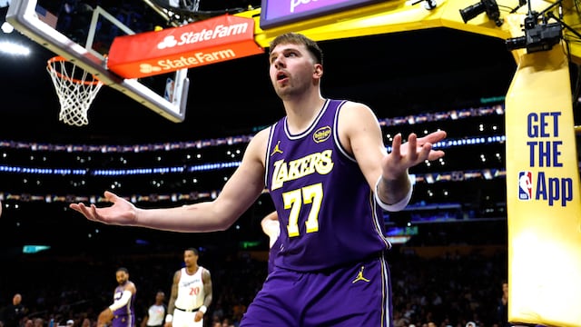 LOS ANGELES, CALIFORNIA - NOVEMBER 25: Luka Doncic #77 of the Los Angeles Lakers reacts to a referee on a Lakers foul during a 135-118 win over the LA Clippers at Crypto.com Arena on November 25, 2025 in Los Angeles, California. Harry How/Getty Images/AFP NOTE TO USER: User expressly acknowledges and agrees that, by downloading and or using this photograph, User is consenting to the terms and conditions of the Getty Images License Agreement. (Photo by Harry How/Getty Images) (Photo by Harry How / GETTY IMAGES NORTH AMERICA / Getty Images via AFP)