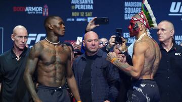 NEW YORK, NEW YORK - NOVEMBER 11: (L-R) Opponents Israel Adesanya of Nigeria and Alex Pereira of Brazil face off during the UFC 281 ceremonial weigh-in at Radio City Music Hall on November 11, 2022 in New York City. (Photo by Jeff Bottari/Zuffa LLC)