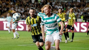 Soccer Football - UEFA Champions League - Play Off - Second Leg - Kairat v Celtic - Ortalyk Stadion, Almaty, Kazakhstan - August 26, 2025 Celtic's Liam Scales in action with Kairat's Ofri Arad REUTERS/Pavel Mikheyev