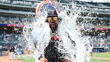 MINNEAPOLIS, MINNESOTA - JULY 12: Byron Buxton #25 of the Minnesota Twins is doused with water after the game against the Pittsburgh Pirates at Target Field on July 12, 2025 in Minneapolis, Minnesota. The Twins defeated the Pirates 12-4. David Berding/Getty Images/AFP (Photo by David Berding / GETTY IMAGES NORTH AMERICA / Getty Images via AFP)