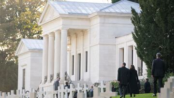 US Vice President Kamala Harris (3R) and US Second Gentleman Doug Emhoff (4R) tour the Suresnes American Cemetery on the eve of Veterans Day in the United States and WWI Armistice Day in France, on November 10, 2021, as part of her visit to France. (Photo