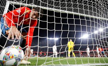 Soccer Football - UEFA Nations League - League A - Group 4 - Spain v England - Estadio Benito Villamarin, Seville, Spain - October 15, 2018 Spain's Alvaro Morata picks the ball out of the net after Sergio Ramos scored their second goal